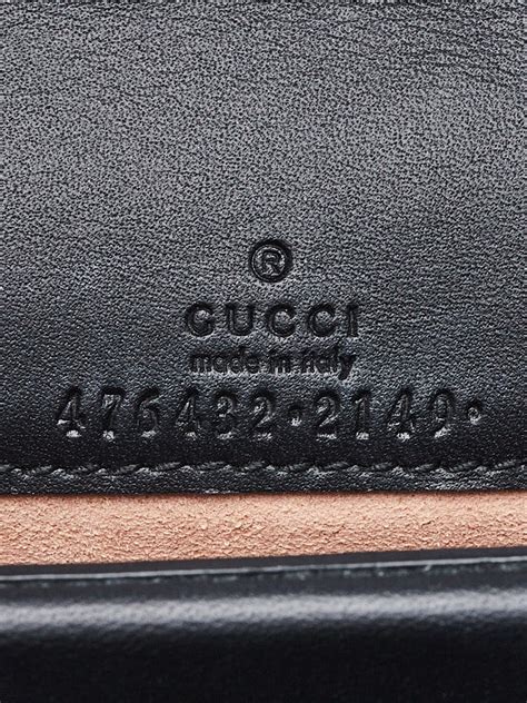 cartera gucci vintage|Gucci serial number tag.